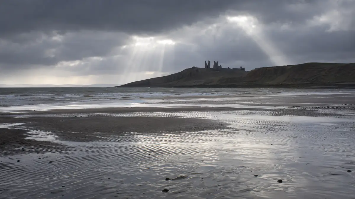 The Northumbrian coast: fortresses on headlands, grey sea and a shoreline fought over for centuries. The Saxon Stories live here.